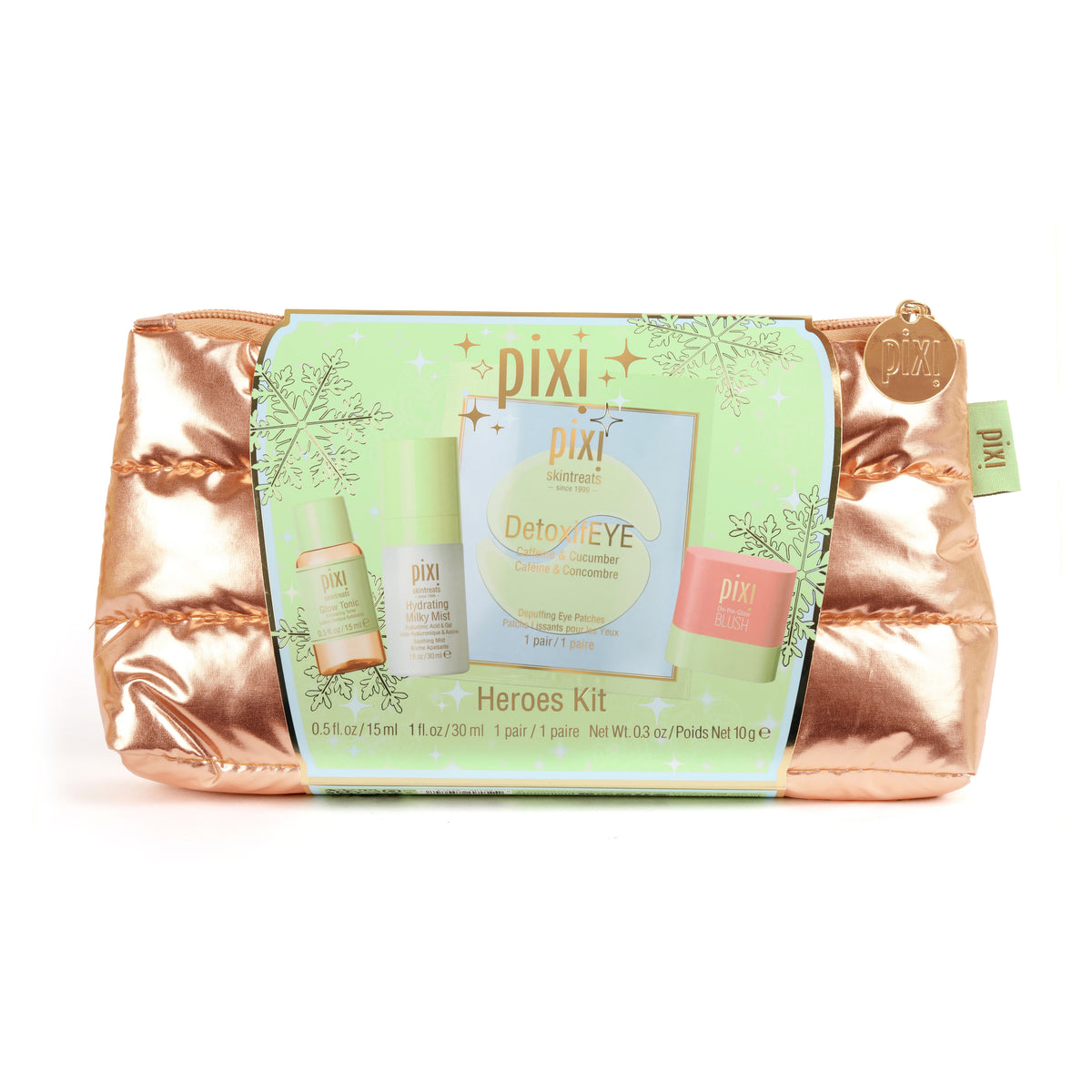 Pixi Heroes Kit makeup set in a metallic rose gold puffer pouch, featuring a green product insert card with images of the included items.