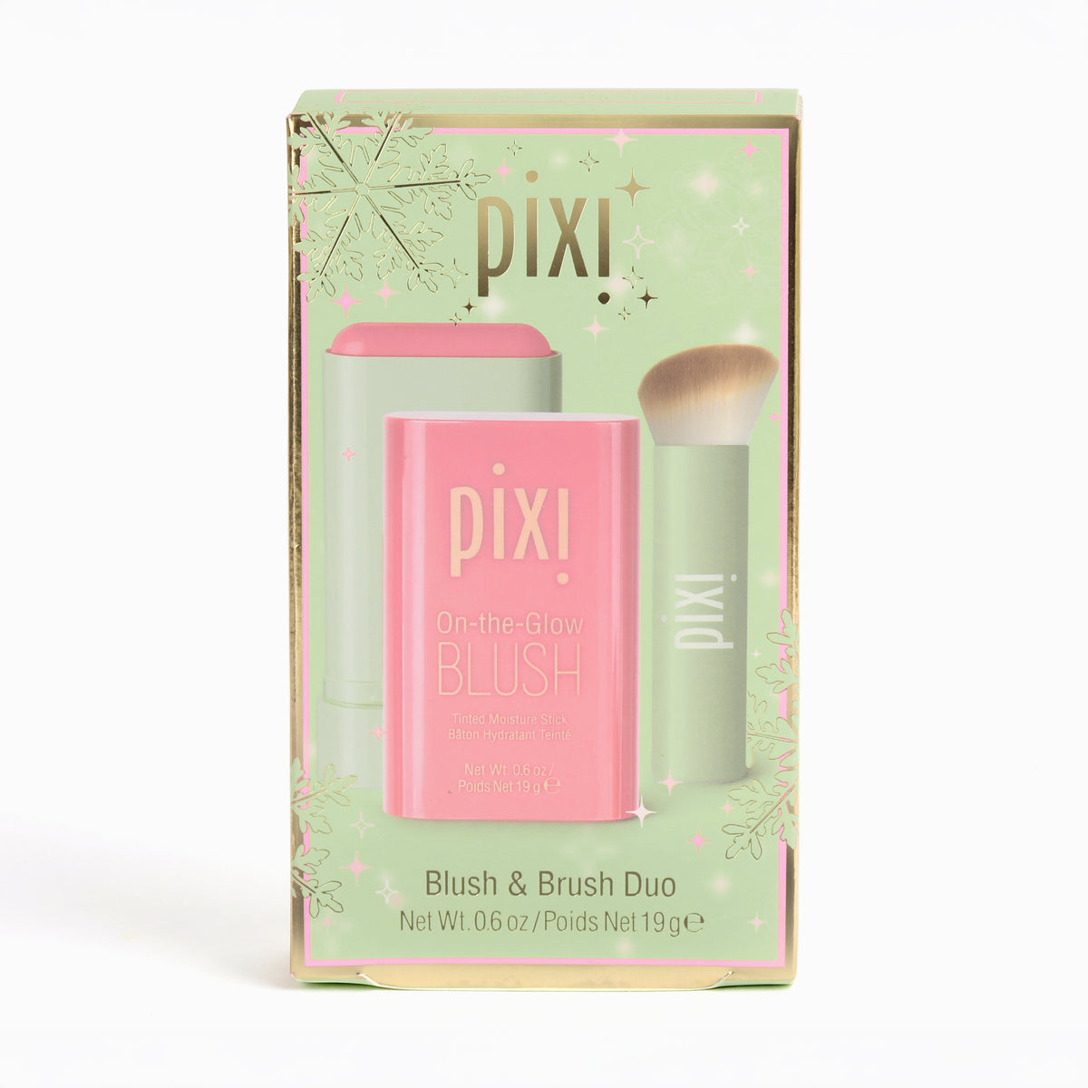 Pixi On-the-Glow Blush Blush & Brush Duo in its original packaging, featuring a pink blush stick and a light green makeup brush on a light green and gold illustrated box.