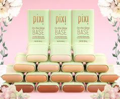 On-the-Glow Base in all shades on a pink background