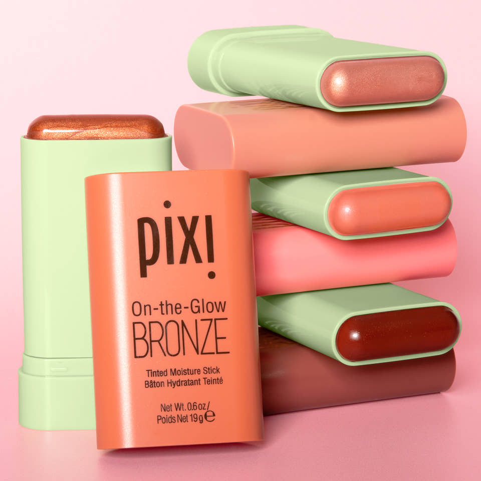 Four Pixi On-the-Glow BRONZE cream bronzer sticks in SoftGlow, WarmGlow, RichGlow and BeachGlow. view 1